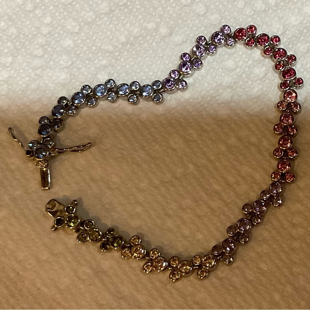 Disney:multi colored 7.5 inch tennis bracelet in pure sterling and ZC gemstones.